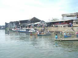Landing of the Public Boat in the Harbour of Manado